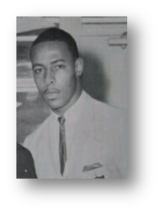 Man in suit, black and white photo.