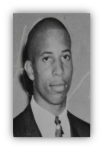 Portrait of a man in a suit.