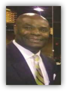 Smiling man in a suit and tie.
