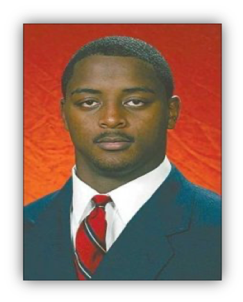 Man in suit with red tie portrait.