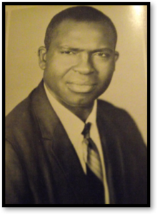 Portrait of a man in a suit.