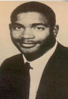 Portrait of a man in a suit.