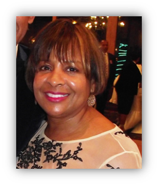 Smiling woman at an elegant event.